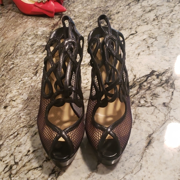 Christian Louboutin - Picture 1 of 4